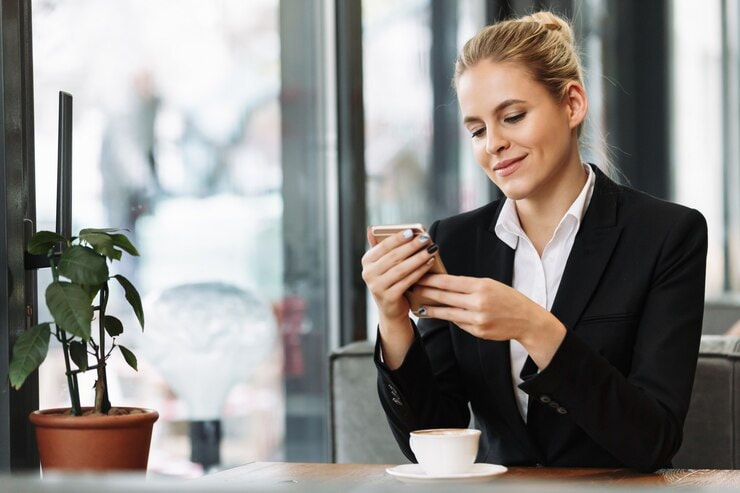 woman sending a text message