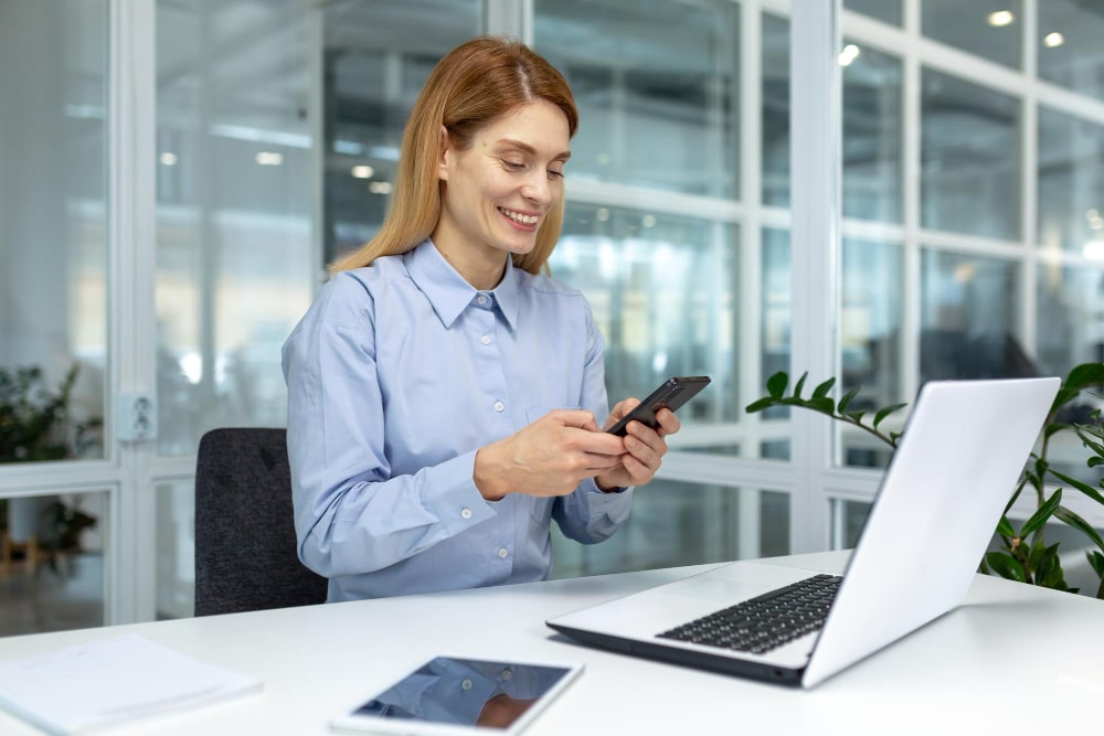 woman sending a text message