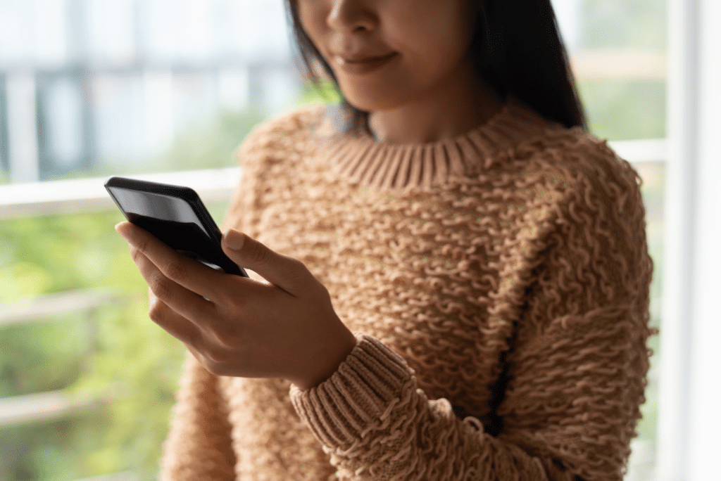 Woman looking at her phone