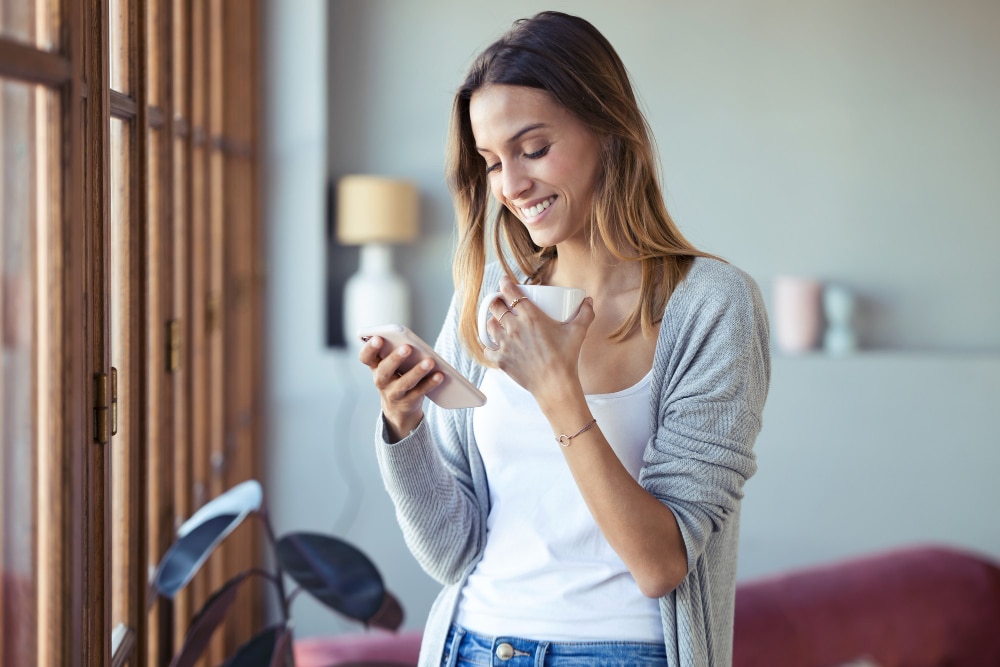 woman sending a text message