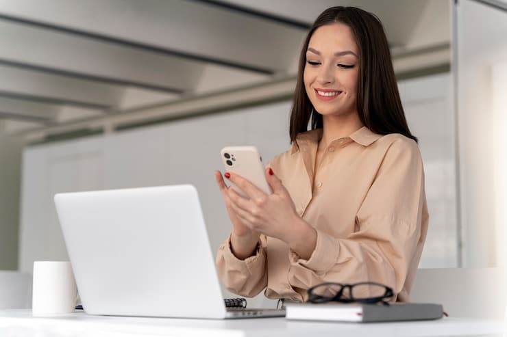 woman sending a text message