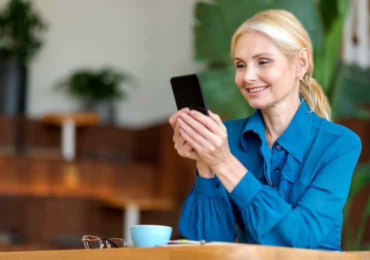 woman sending a text message