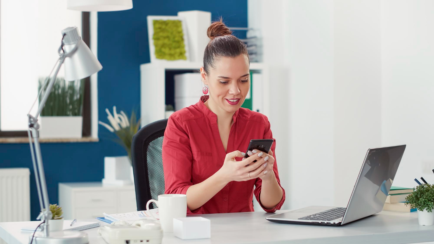 woman sending a text message