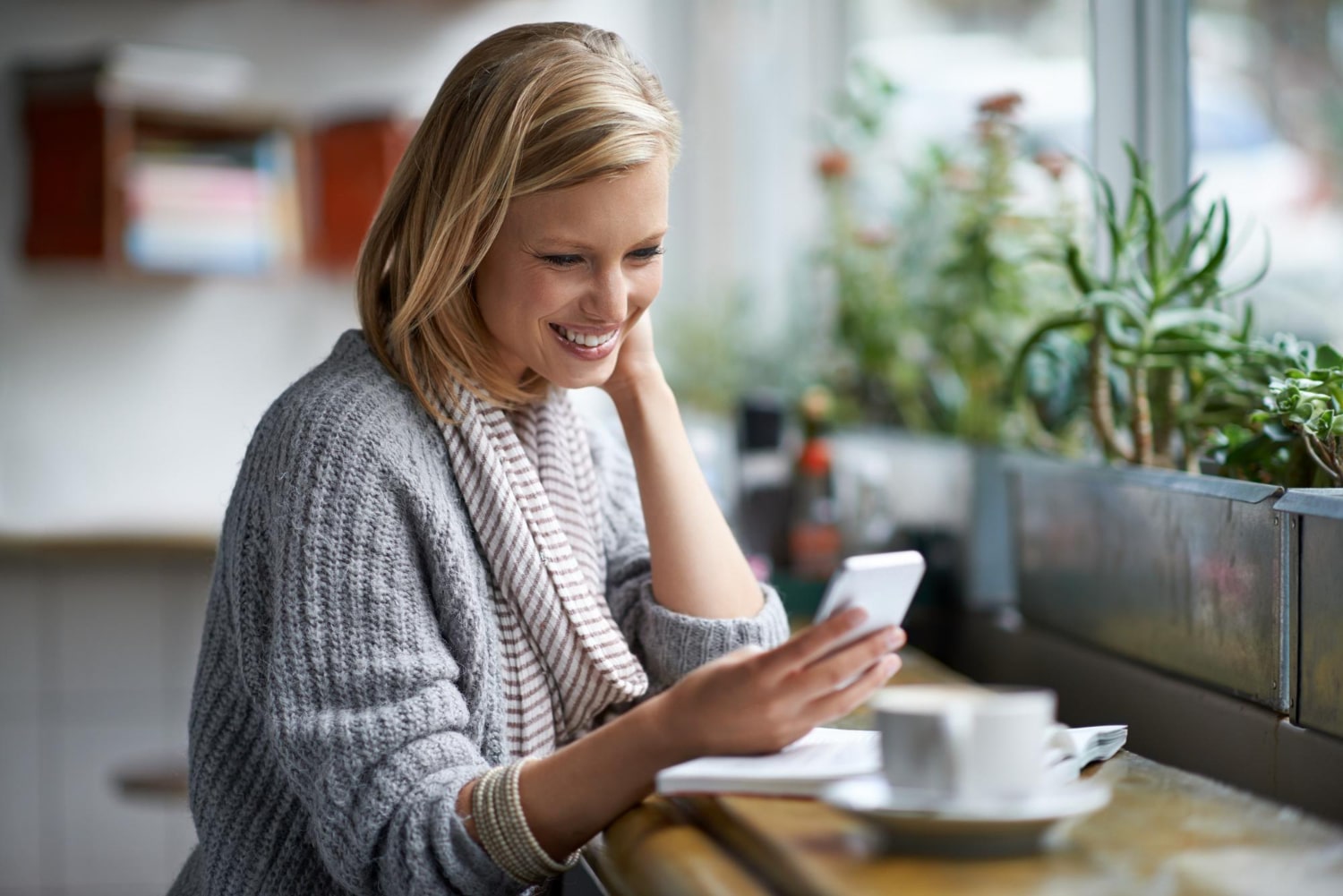 woman sending a text message